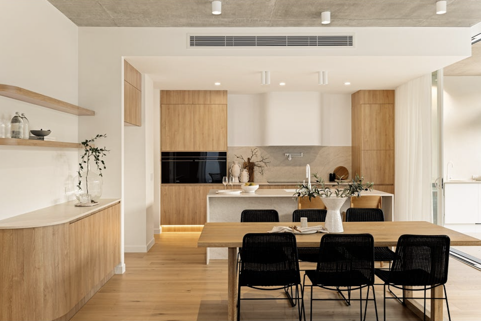 oak contemporary kitchen with black features, property styling by blink living
